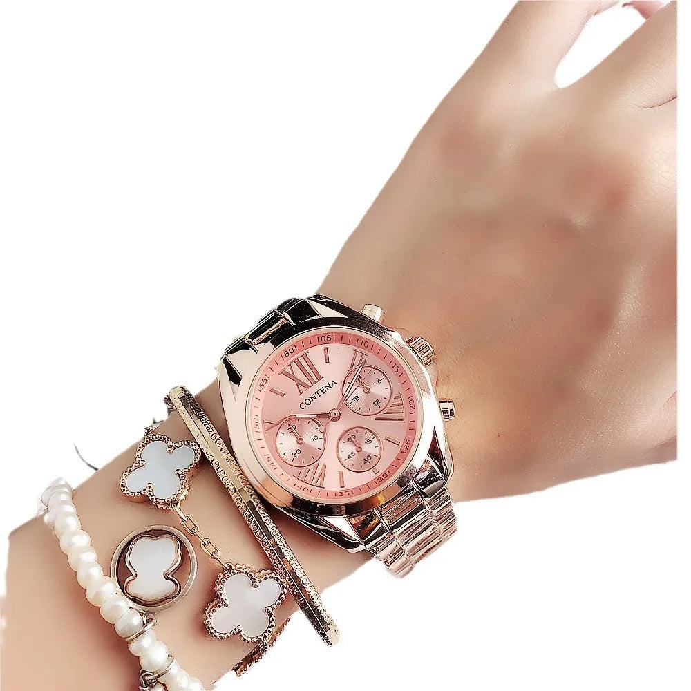 Women's silver rose gold quartz watch with diamond crystal mesh strap and analogue display.