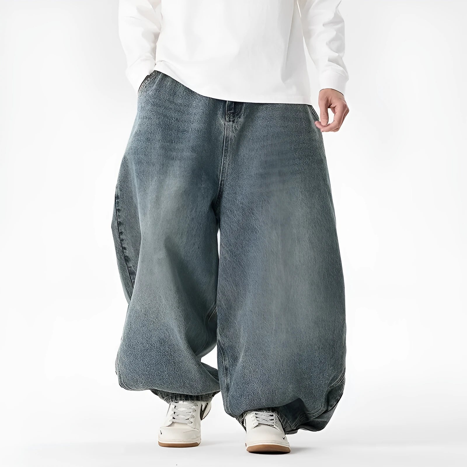 Men's plus size light blue wide leg baggy jeans on a hanger