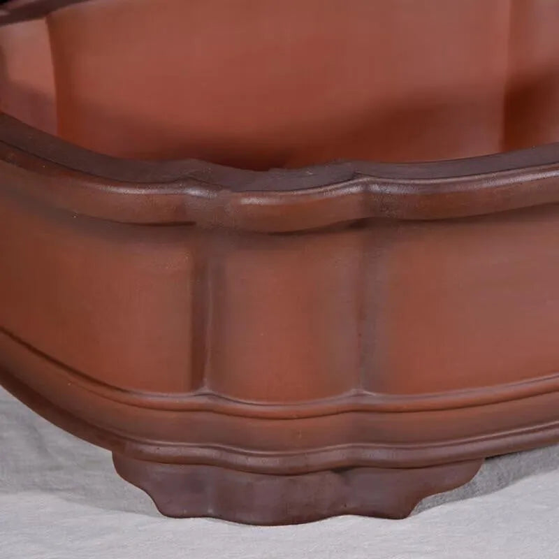 Antique finished rectangular purple clay flowerpot with detailed tree stump and floral relief carving.