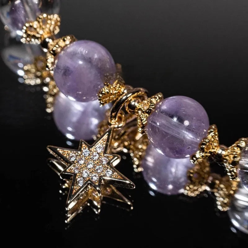 Women's eight Awn star artificial crystal bracelet in a gift box.
