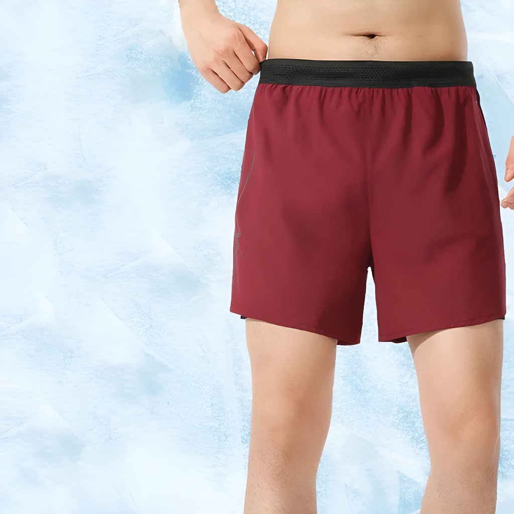Men's solid-colour basketball shorts in polyester fabric with low-waist design