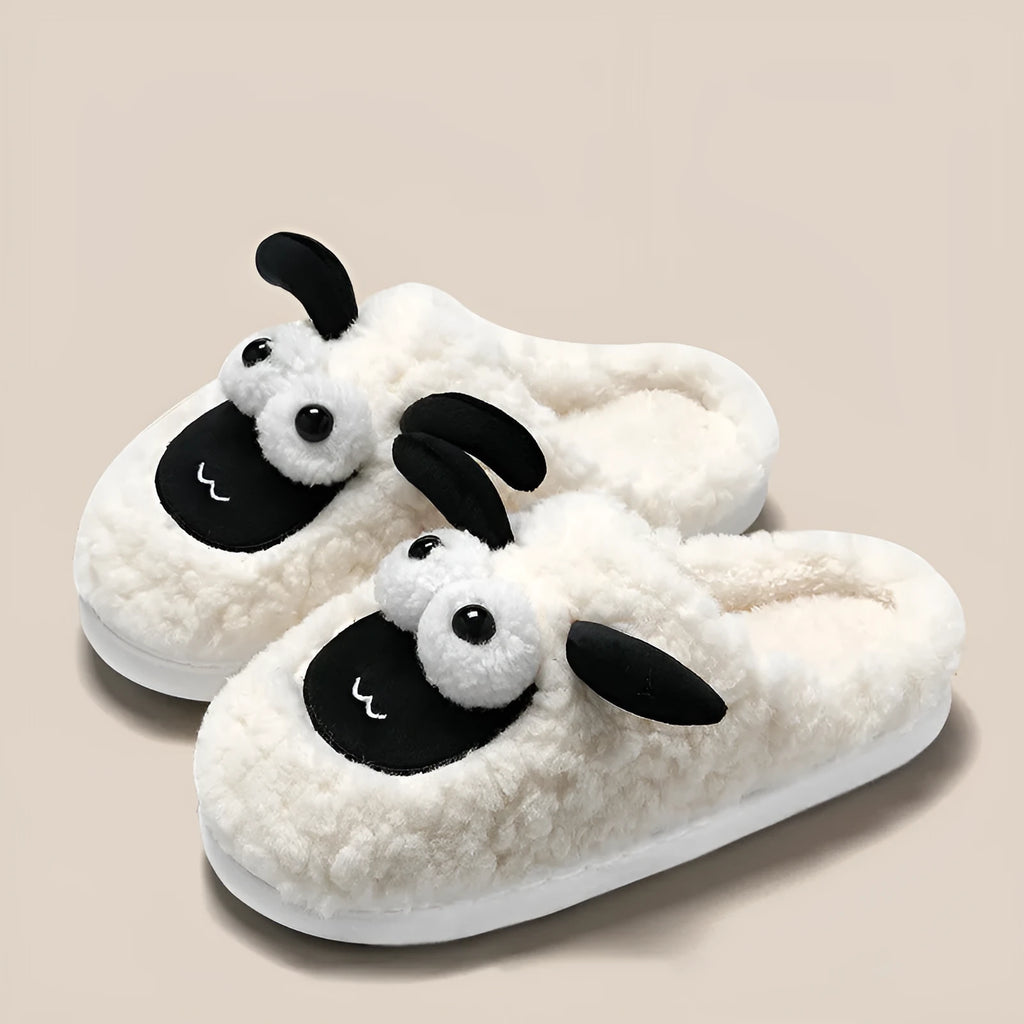 Brown lamb thermal cotton slip-on slippers with sewn PVC sole on wooden floor