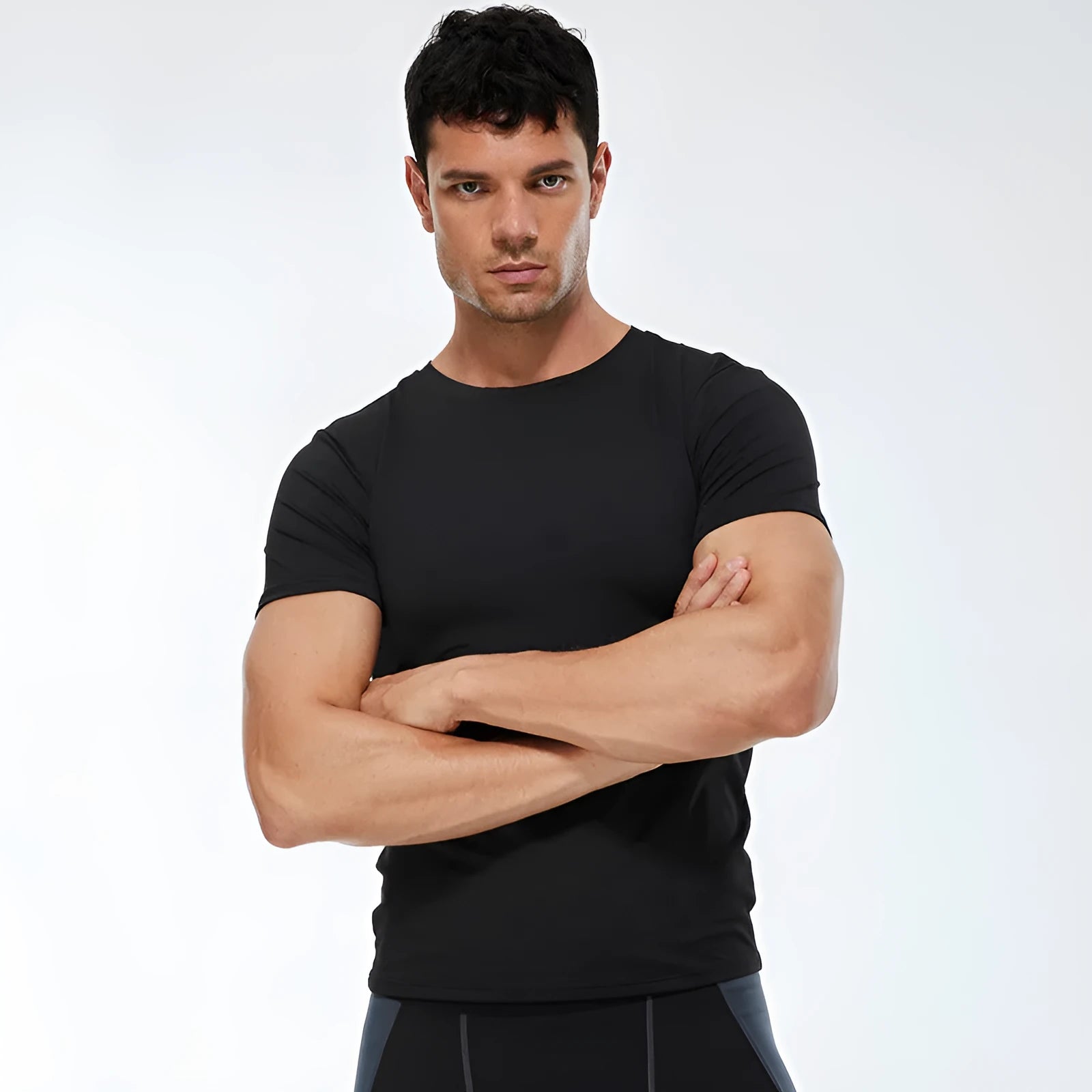 Men's solid colour polyester quick drying short sleeve fitness shirt available in seven colours