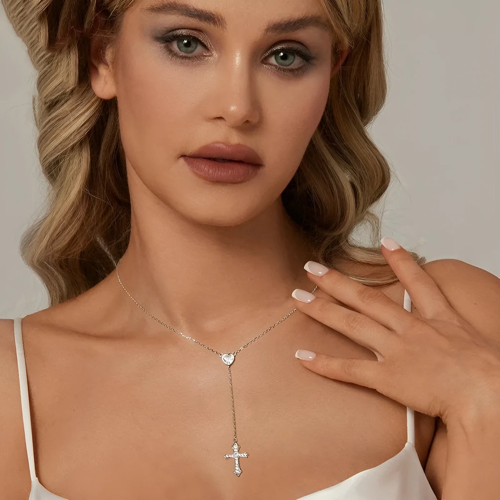 Women's simple V-neck Love cross pendant necklace made from 925 silver on an O-ring chain.