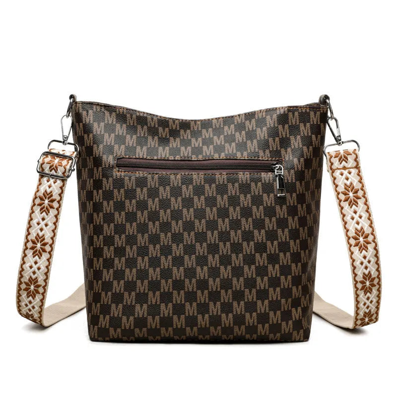 PU leather retro dumpling-shaped shoulder bag in black, brown and white colours with sandwich pocket design