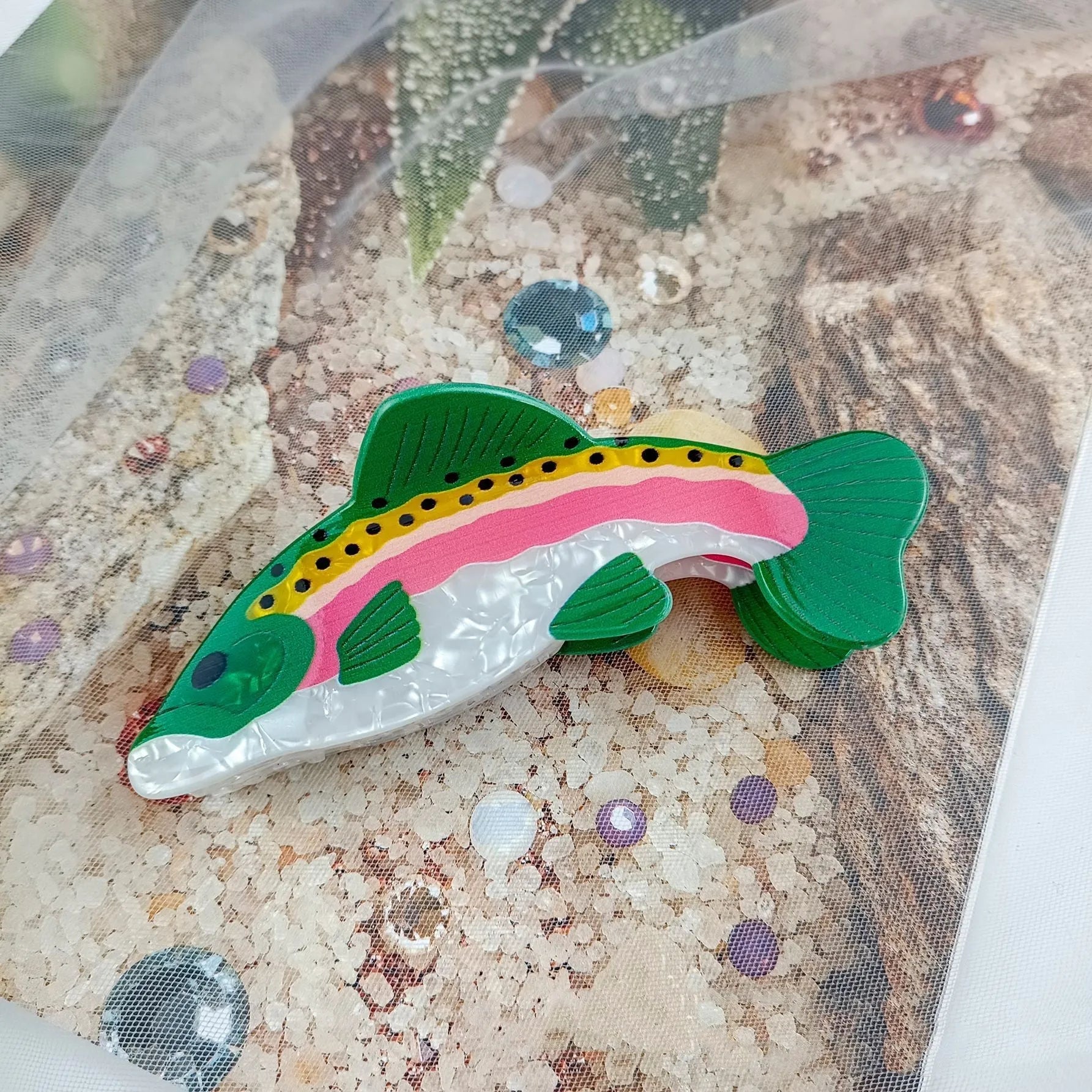 Dark green PVC hair clip with printed rainbow trout marine design