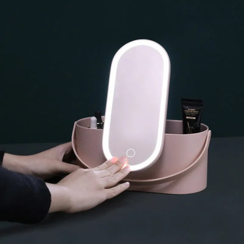 Pink portable plastic storage box with a built-in aluminium makeup mirror