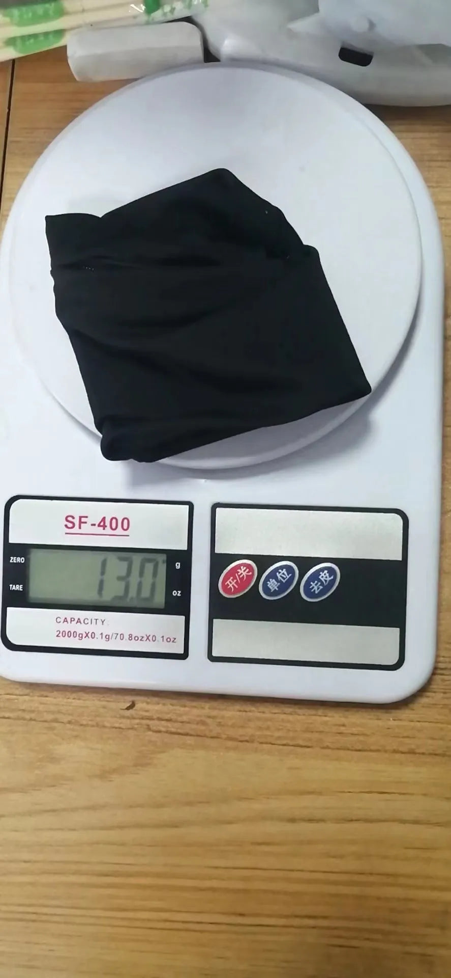 Compact 10 by 10.5cm wrist-worn armband sleeve for carrying a mobile phone.