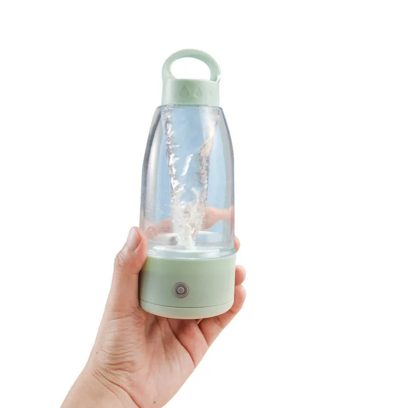 Automatic electric shaker bottle with USB charging port in green, pink, and white colours.