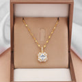 Gold-toned titanium steel necklace with geometric quadrilateral zircon pendant on a water wave chain.