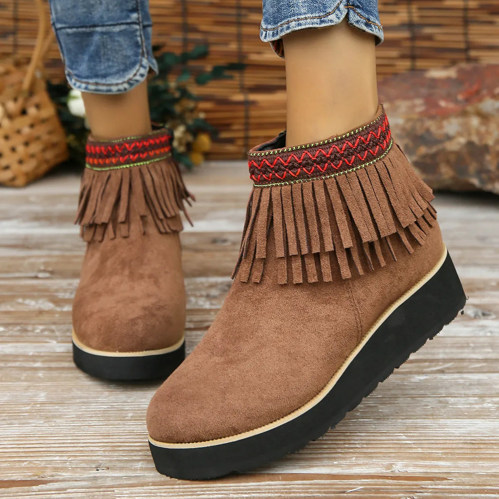 Women's suede wedge ankle boot with thick rubber sole and side zip in black, blue, or dark brown