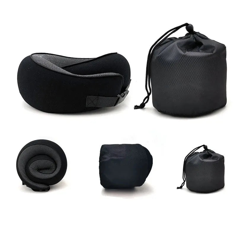 Navy blue U-shaped travel neck pillow with memory foam filling shown rolled for compact storage