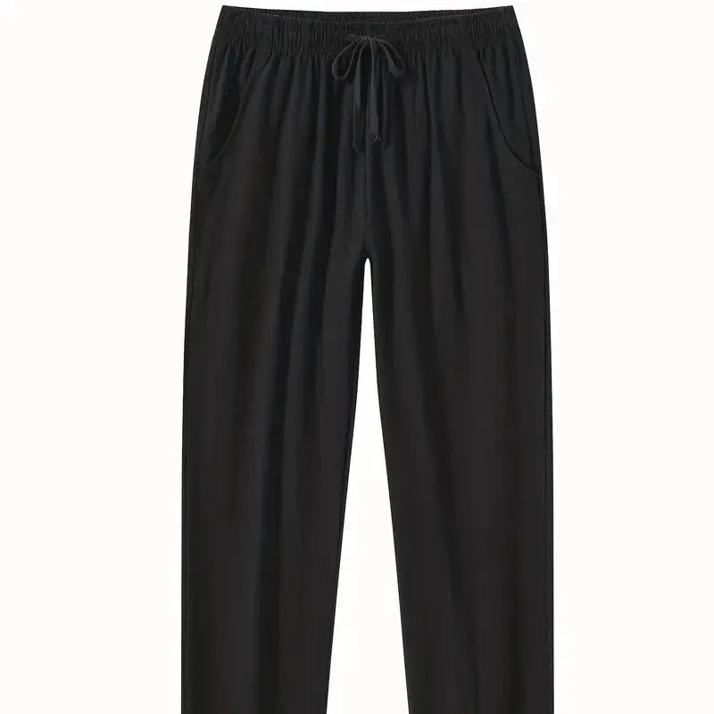 Men's cotton beach pants in loose casual fit showing solid colour options