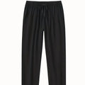 Men's cotton beach pants in loose casual fit showing solid colour options