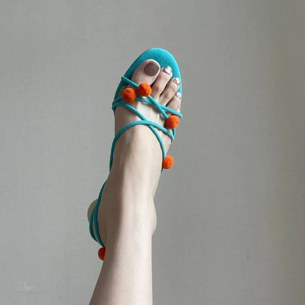 Cyan women's leather high-heel sandals with lace-up straps and ball decoration