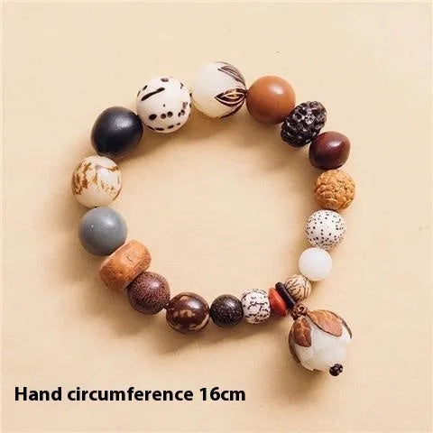 Handmade Bodhi seed bracelet with 18 natural beads in geometric pattern measuring 16cm