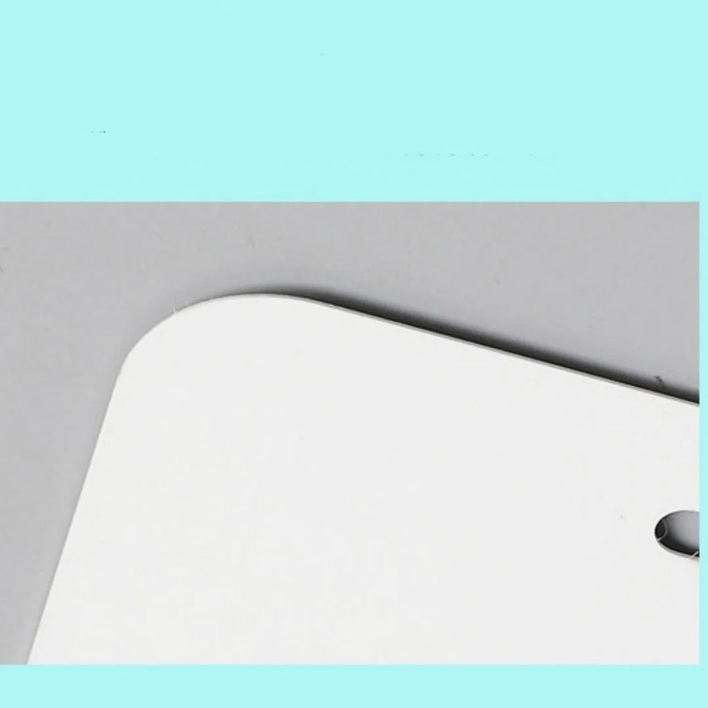 White aluminium licence plate blank measuring 30.3 by 15 centimetres with four thickness options