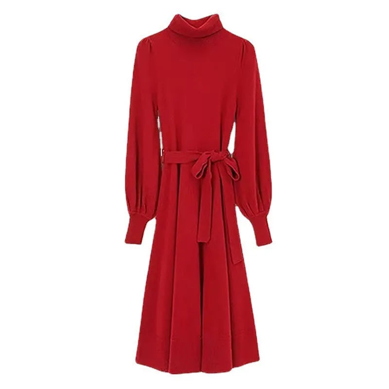 Women's rose red turtleneck knitted dress with long sleeves and a mid-length skirt.