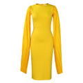 A yellow high-waisted long sleeve evening gown with a round neck and pleated skirt, laid flat.