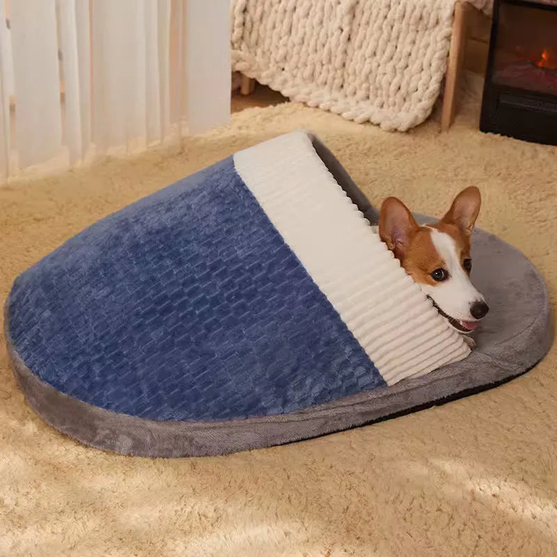 Blue round dog nest bed with removable cover for small medium dogs on a wooden floor