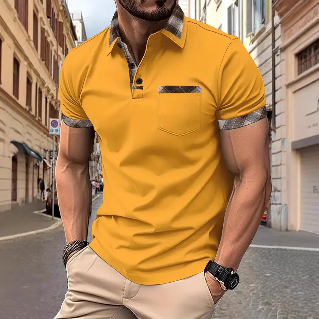 Man wearing a loose-fit plaid colourblock short sleeve t-shirt in a summer setting.