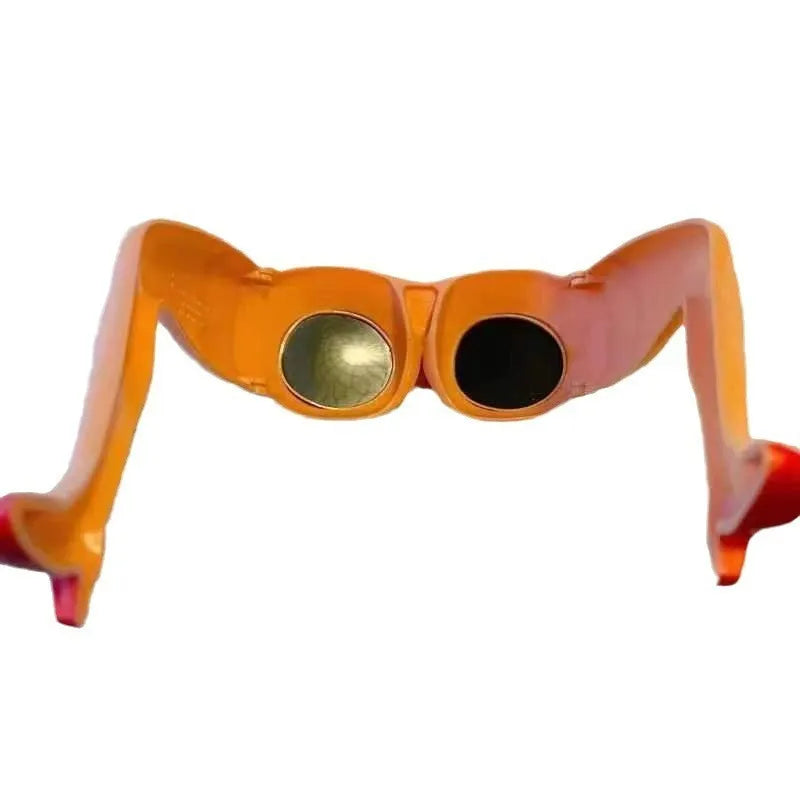 Orange plastic novelty sunglasses accessory for legs and hips on a white background.