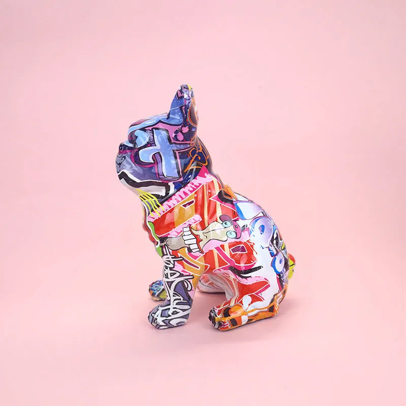Modern graffiti-colour French bulldog resin statue on a shelf.
