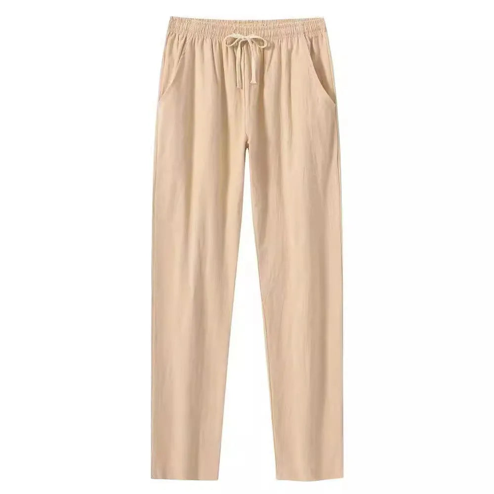 Men's cotton beach pants in loose casual fit showing solid colour options