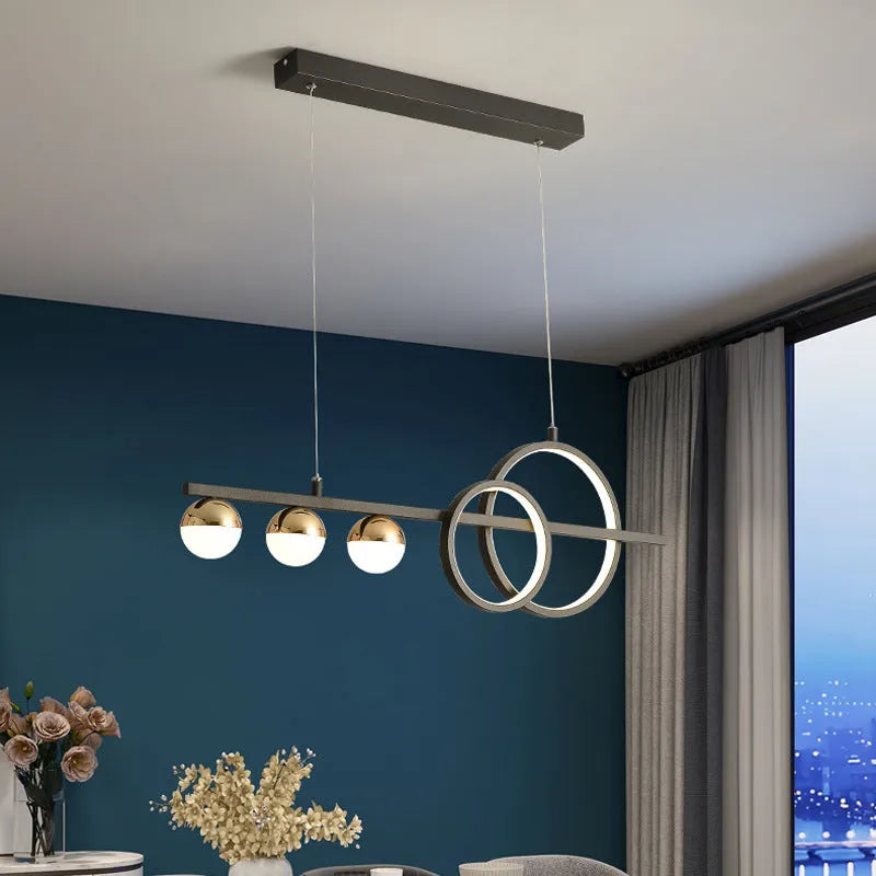 Modern rectangular aluminium ceiling lamp in black or gold with remote control for dimming.