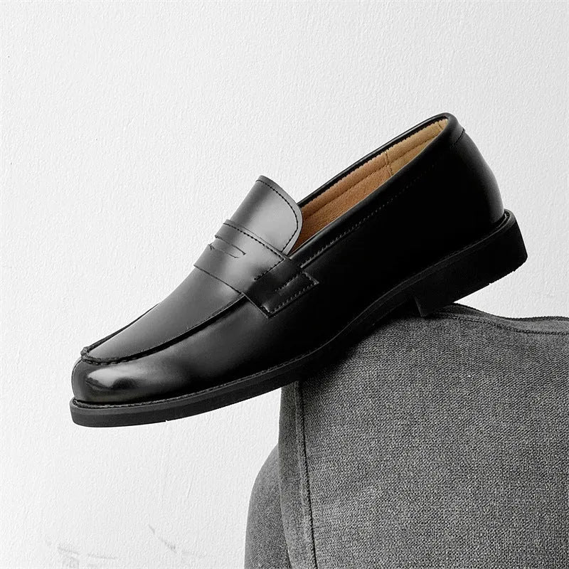 Men's black slip-on Derby leather shoes with a Microfiber upper and rubber sole.
