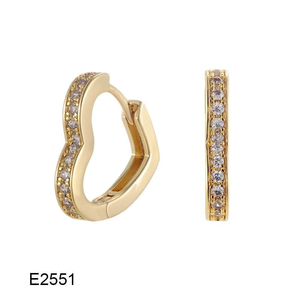 Brass gold plated heart shape clip-on earrings with gang drill detailing on a copper base.