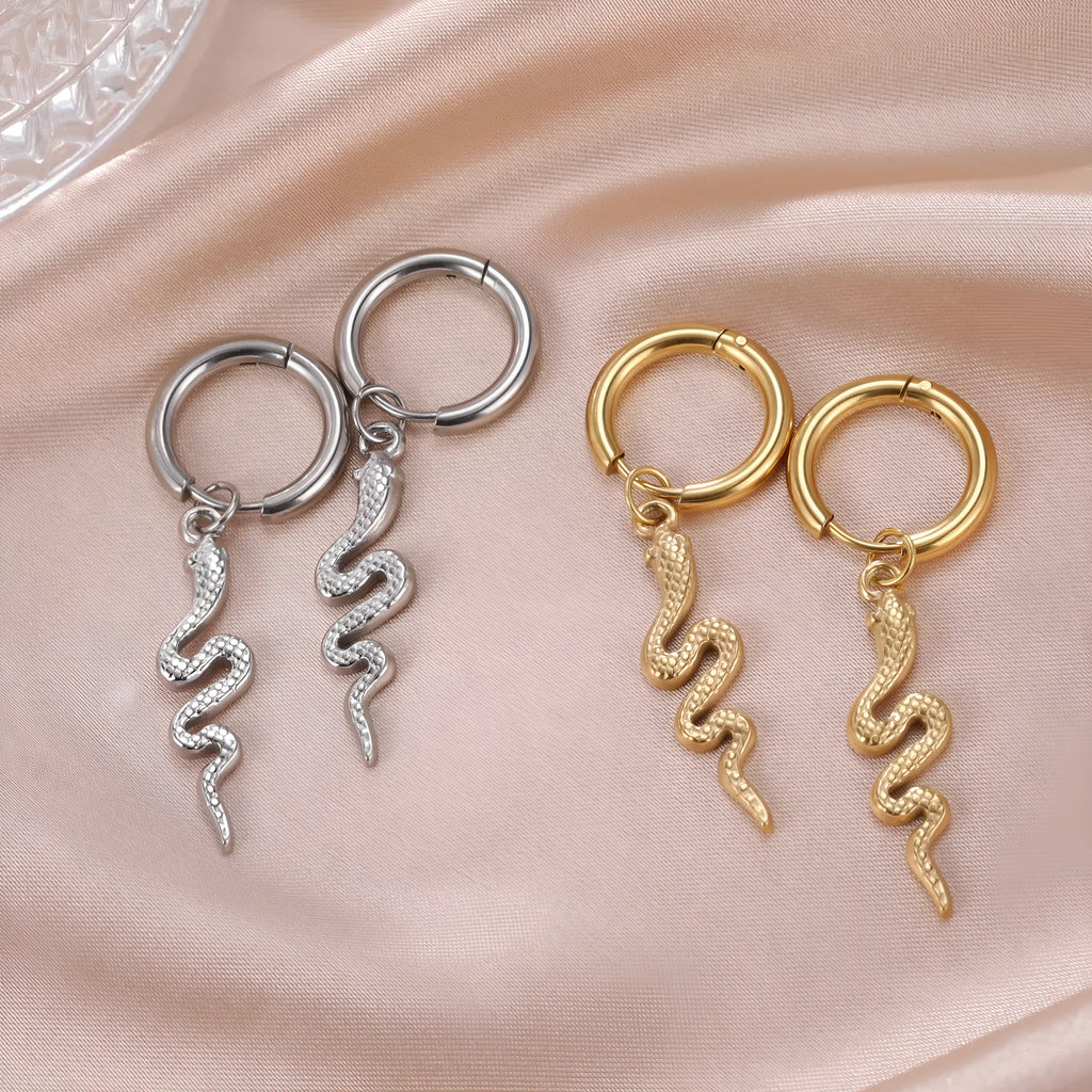 Gold plated stainless steel snake-shaped vintage earrings with ear clip fastening