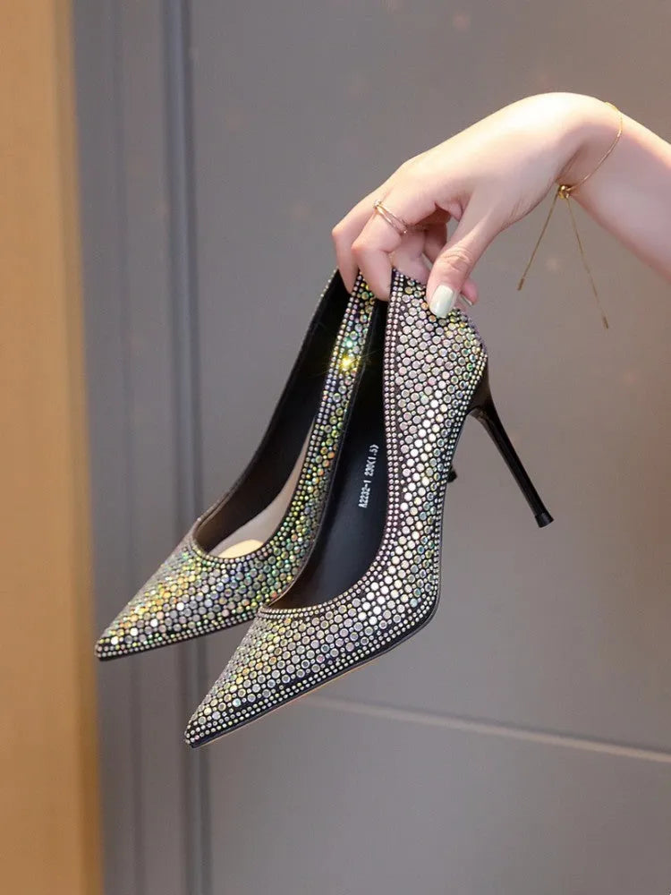 Women's black diamond bird banquet pumps with pointed stiletto heel and PU upper