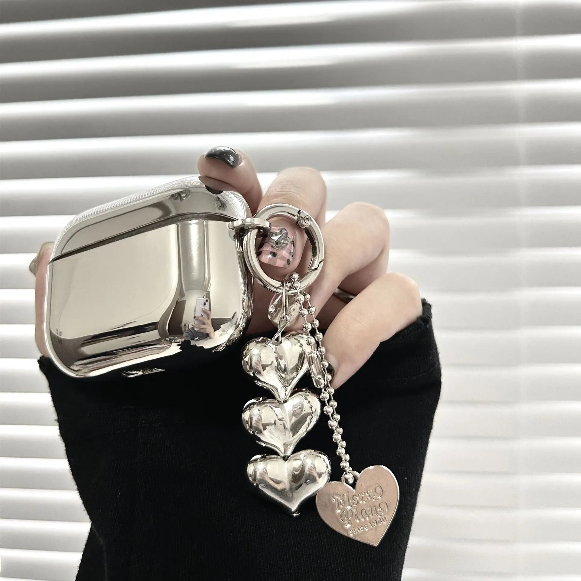 Electroplated solid colour heart pendant design TPU case for AirPods with a carrying chain attached