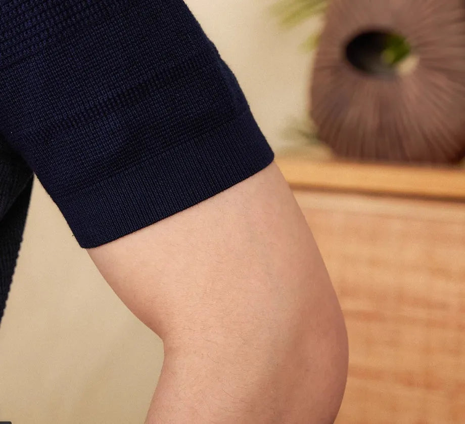 Men's retro-style short-sleeved cotton T-shirt on a hanger, shown in off-white and royal blue colour options.
