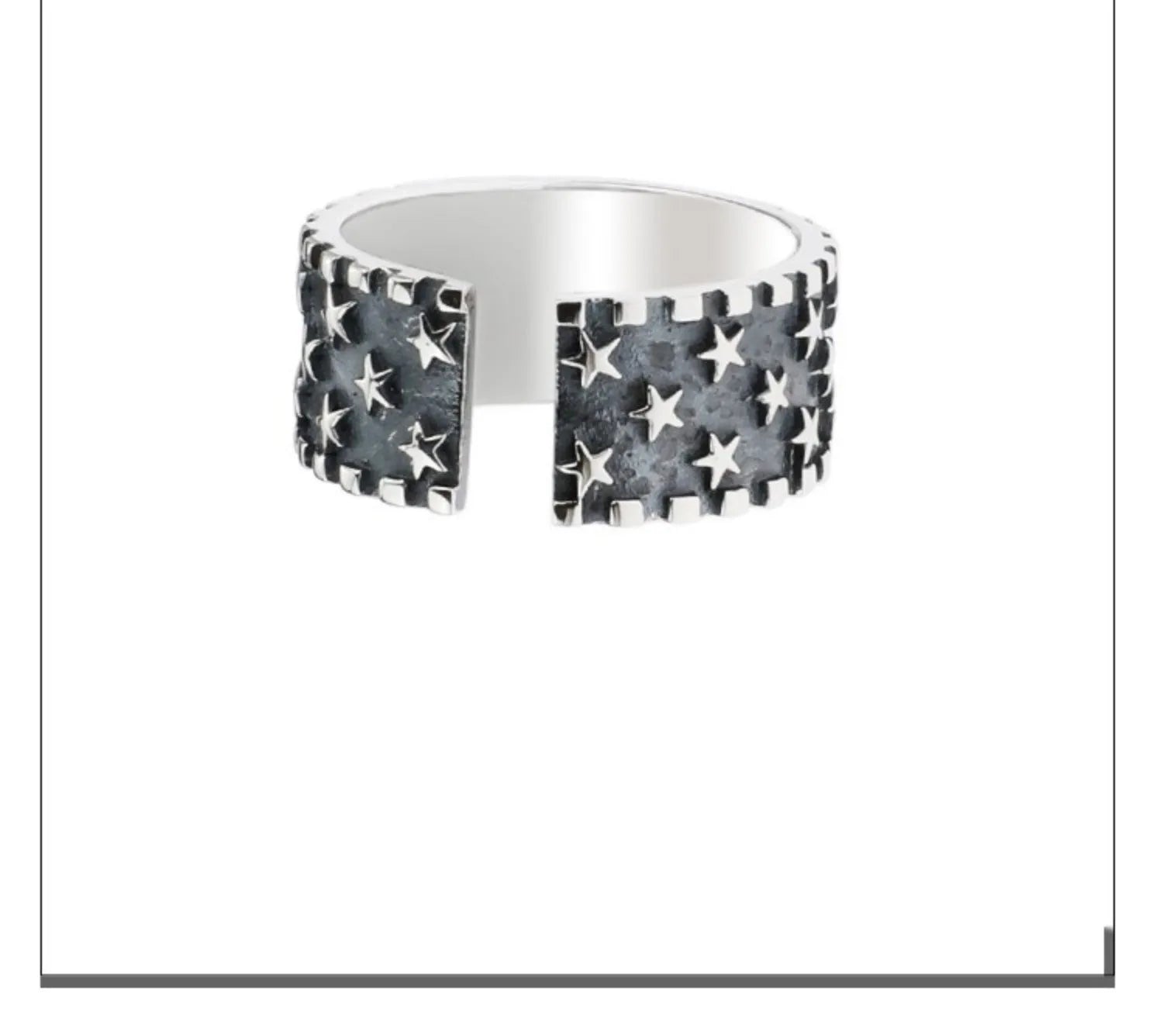 Adjustable open-ended sterling silver ring with a geometric multi five-pointed star pattern.