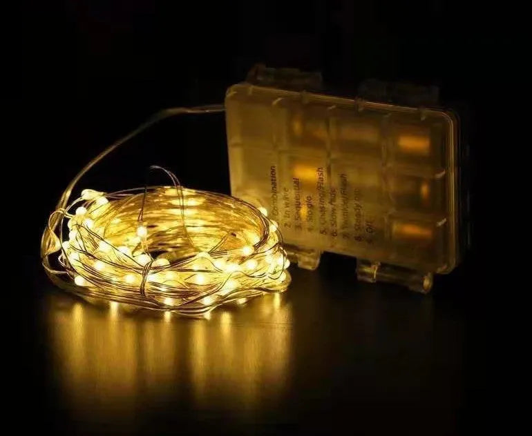12 metre long copper wire LED string lights in multiple colours, powered by batteries or USB.