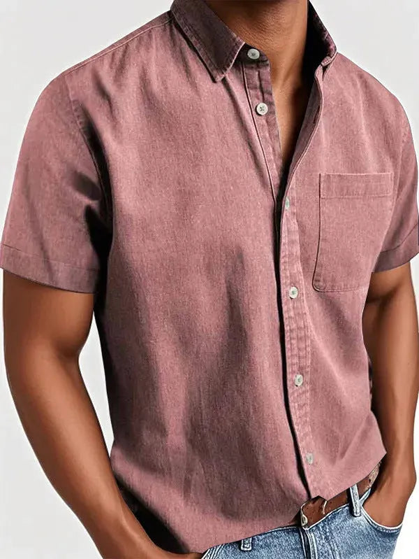 Men's solid colour short-sleeved polo shirt with a classic collar and a single chest pocket.