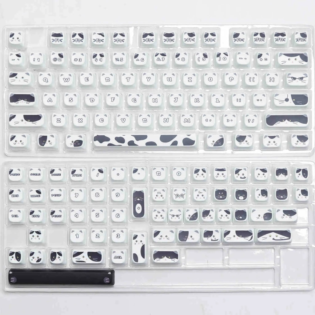 Black and white kitten sublimation PBT key cap set in boxed packaging, full layout excluding 7u and March space keys