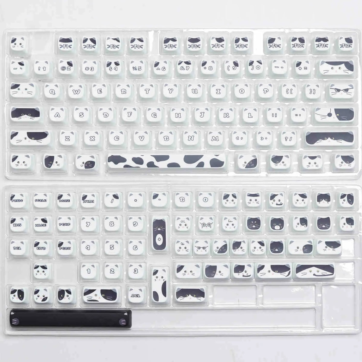 Black and white kitten sublimation PBT key cap set in boxed packaging, full layout excluding 7u and March space keys