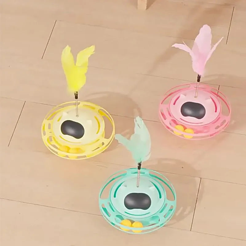 Pink cat tumbler turntable toy with self-moving rotational action for interactive feline play