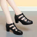 Women's beige closed toe sandals with woven hollowed design, chunky heel, and ankle-strap buckle.