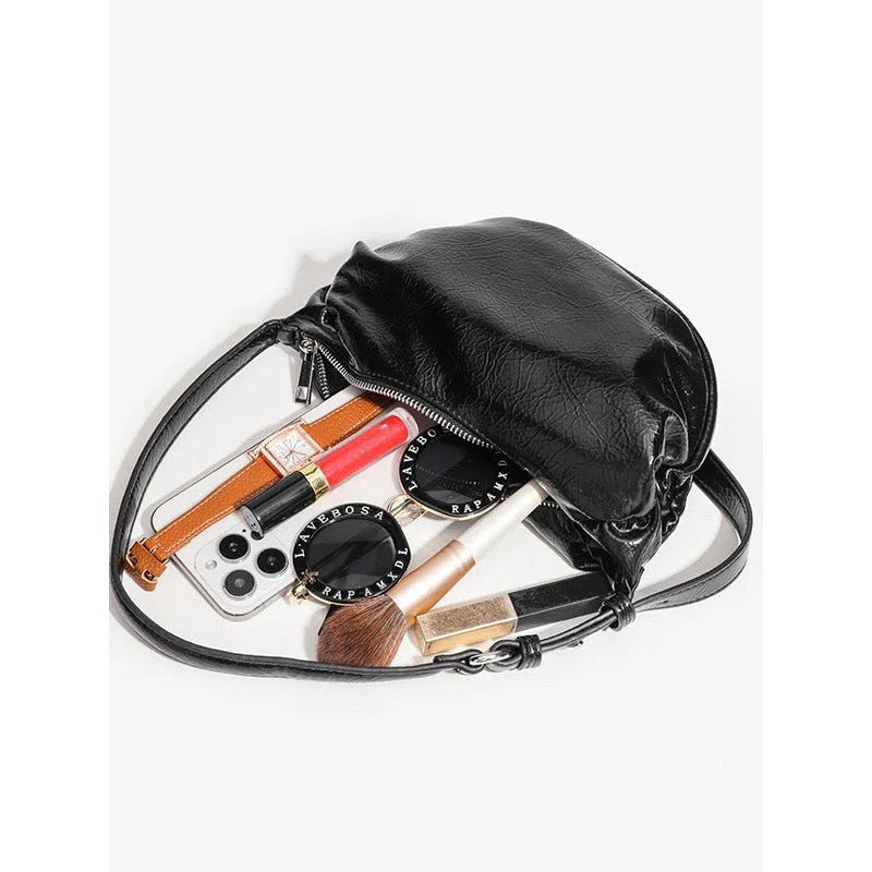 Black PU pleated shoulder bag rock-and-roll style with dumpling shape and outer pocket