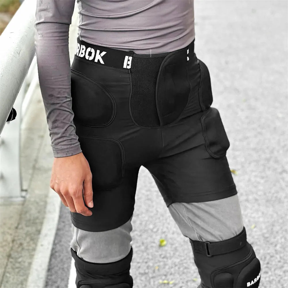 Black adult hip pad for sports protection, showing adjustable waistband and NBR padding on Spandex material.