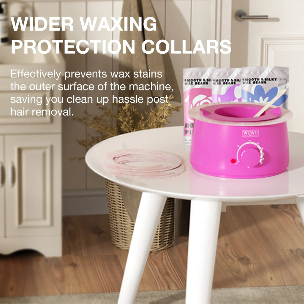 Professional waxing kit with black wax warmer, pots of hard wax beans, applicator sticks, post-care lotion, and ice masks.