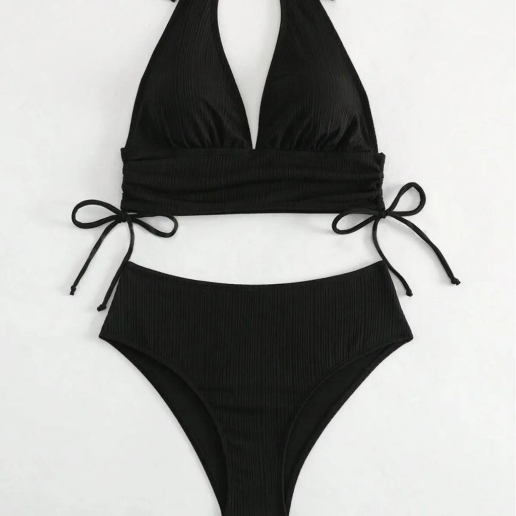 Black lace-up halter bikini set with matching briefs on mannequin