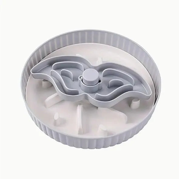 Pet slow feeder bowl with coloured plastic base and a textured silicone lick mat insert in a snowflake pattern.