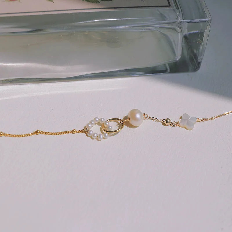 Women's natural pearl bracelet with freshwater pearls and 14k gold-plated fittings