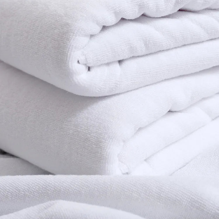 White thickened cotton bath towel measuring 100x200cm weighing 800g with plain weave texture