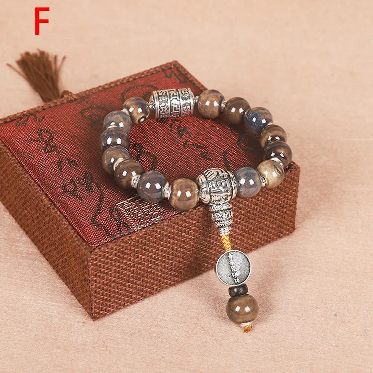 Men's gradient coloured glaze ceramic bracelet with Yonghe blessing charm and polished beads.